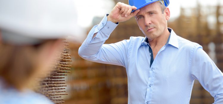 colleagues with hard hats